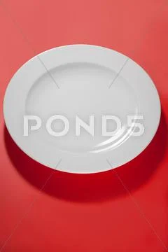 White Empty Plate Ping -Red Background With Shadow