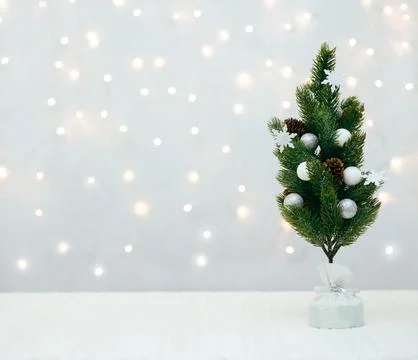 White empty tabletop with a Christmas tree. Image for montage or display your Stock Photos