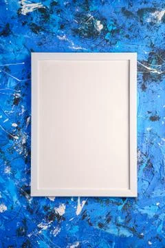 White empty template picture frame on textured blue background Stock Photos