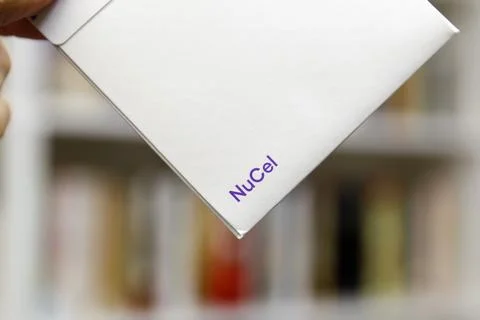 White envelope containing the physical NuCel SIM card from Nubank mobile op.. Stock Photos