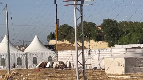White Event Tents Set Up in an Open Outdoor Area Stock Footage 345305396