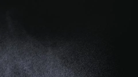 White exploding powder over black background 스톡 일러스트