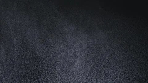 White exploding powder over black background Stock Illustration