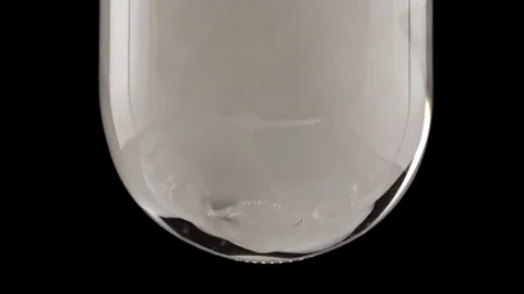 White Explosion of Particles Powder Background in Glass Test tube. White Smoke Stock Footage 270921422