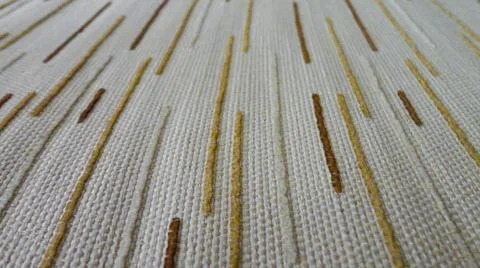 White fabric background with tiny brown lines. Close-up white cotton texture Stock Photos