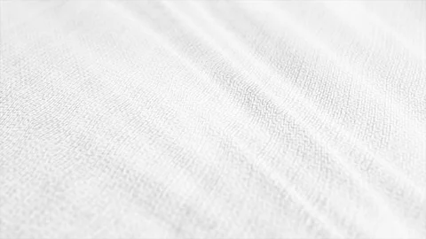 White fabric cloth material is wave. Fashion pattern, detailed burlap.  Stock Footage 121817898