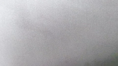 A white fabric with a pattern of squares Stock Photos