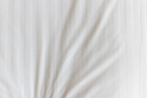 White fabric texture. Soft background. Stock Photos