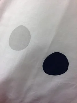 White Fabric With Two Circular Patterns 스톡 사진