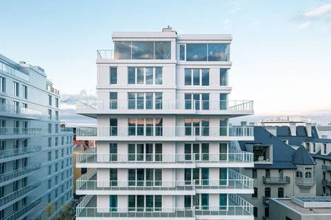 White facade of a modern multi-storey building. View from above Stock Photos