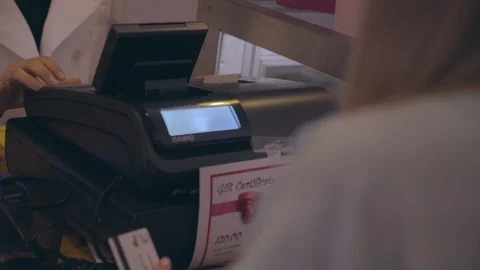 White Female Checking Out at Register Stock Footage 92547856