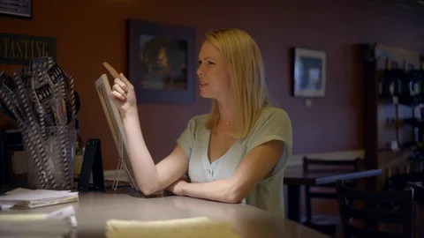 White Female Ordering at Bar Stock Footage 92547305