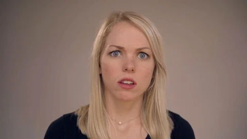 White Female Scared Face Close Up Stock Footage 92545751