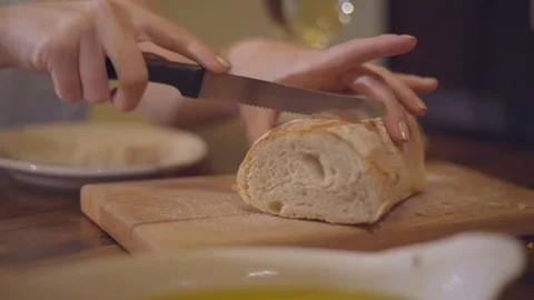 White Female Slicing Bread for Appetizer Stock Footage 92547010