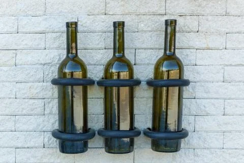 White fence from a stone with different objects Foto stock