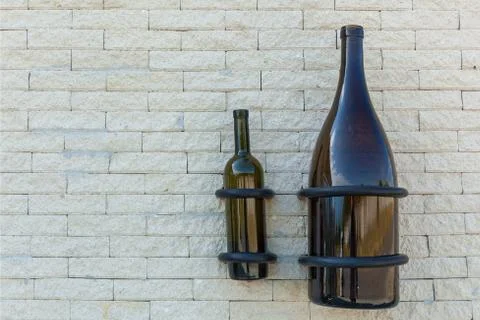 White fence from a stone with different objects Foto stock