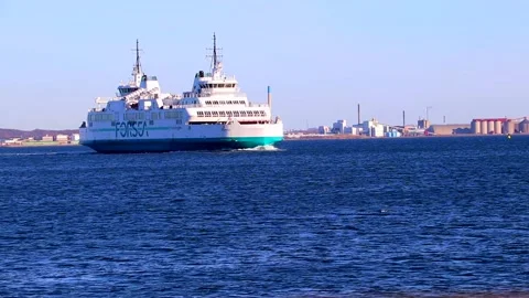 White ferry sailing between Denmark and Sweden on the strait of Oresund Stock Footage 200978703