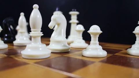 White figures on a chessboard Stock Footage 77279262