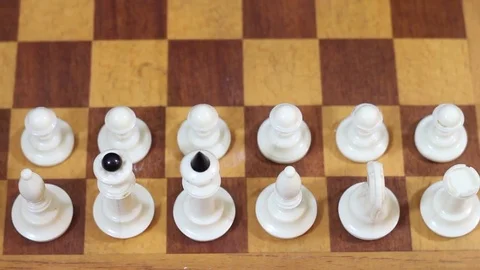 White figures on a chessboard in the starting position Stock Footage 77278659