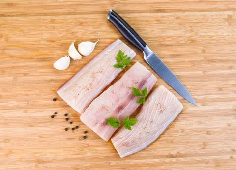 White fish fillets being prepared for cooking Stock-Fotos
