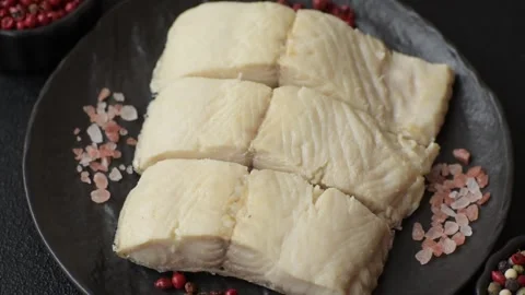 White fish fillets, seafood cooked with salt and spices. Fish fillets Stock Footage 311887381