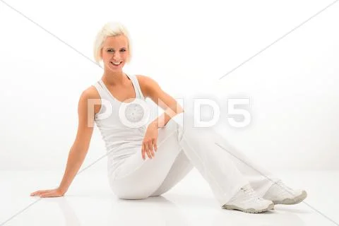White fitness woman relax at pilates exercise Stock Photos
