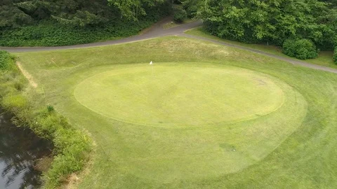 White Flag Blowing in the wind Golf Course Stock Footage 126558706