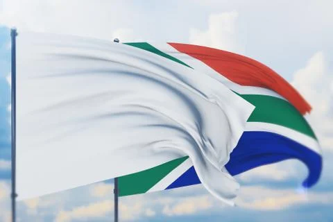 White flag on flagpole waving in the wind and flag of South Africa. Closeup view Illustrazione stock