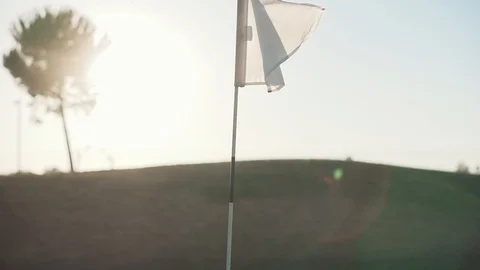 White flag on the golf course Stock Footage 111979941