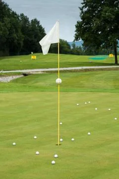 White flag on a golf course Stock Photos