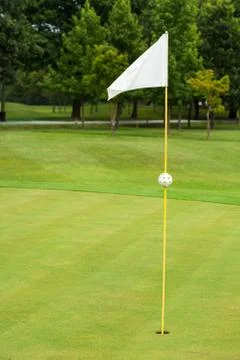 White flag on a golf course Foto stock