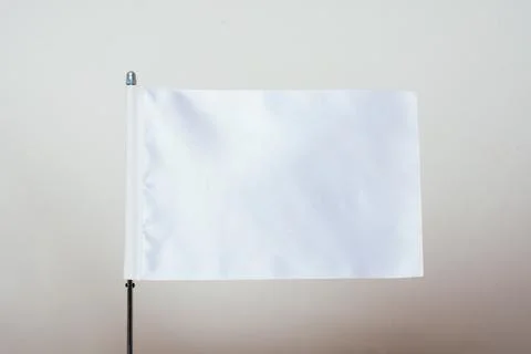 White flag on a white background in display Stock Photos
