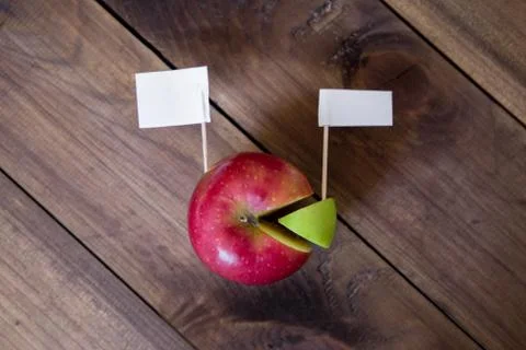 White flags thumbtack on chart made from apple Stock Photos