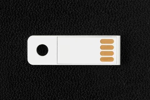 White flash drive on drak background Stock Photos