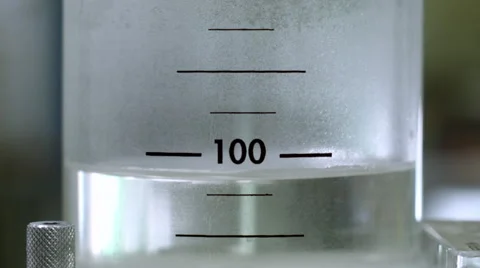 White flask with liquid Video stock 52030044