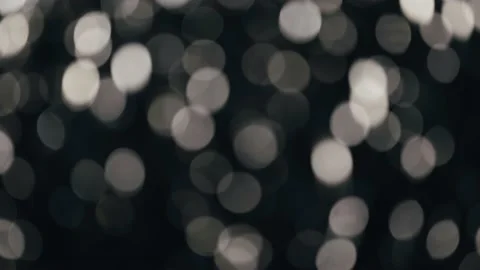 White flicker bokeh on black background 스톡 동영상 217813343