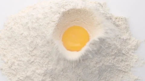 White flour and egg on white background Stock Footage 54459559