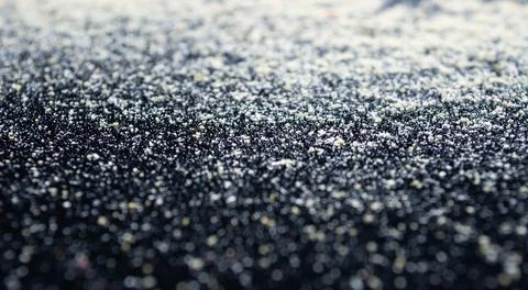 White flour on a black background, texture . Stock Photos