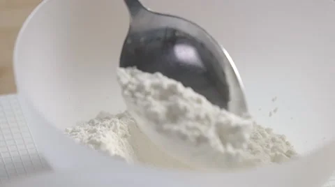 White flour in a bowl Stock Footage 64029970