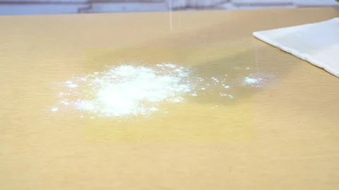 White flour falls to the table in the kitchen Stock-Footage 127081705