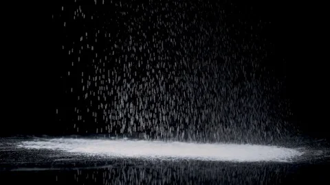 White flour poured on black background Stock Footage 81180810