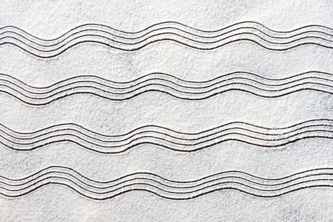 White flour sand waves texture on dark table. Baking, cooking food meal backg Stock Photos