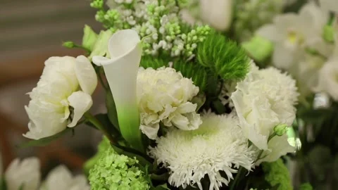 White flowers on a festive table close up Stock Footage 131180812