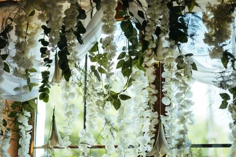 White flowers hanging on the ceiling Stock Photos