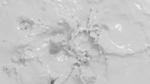 White flows of milk with splashes and liquid textur Stock Footage 279707395