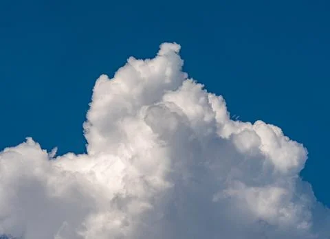 White fluffy big clouds against sky Stock Photos