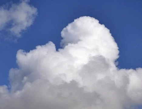 White fluffy cloud over blue sky background, beautiful heaven photo Stock Photos