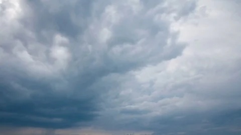 White fluffy clouds and blue sky time lapse Stock Footage 77749926