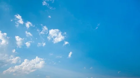 White fluffy clouds and blue sky time lapse Video stock 77749950
