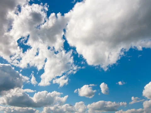 White fluffy clouds and blue sky time lapse Stock Footage 77794719